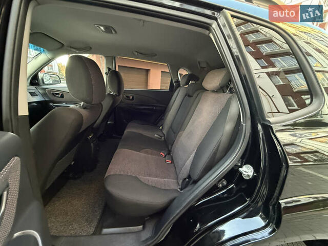 Чорний Хендай Туксон, об'ємом двигуна 2 л та пробігом 156 тис. км за 7850 $, фото 25 на Automoto.ua