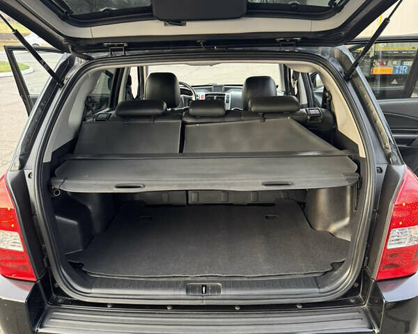 Черный Хендай Туксон, объемом двигателя 2 л и пробегом 210 тыс. км за 7850 $, фото 36 на Automoto.ua