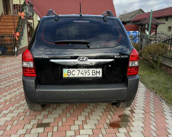 Чорний Хендай Туксон, об'ємом двигуна 2 л та пробігом 314 тис. км за 7000 $, фото 14 на Automoto.ua