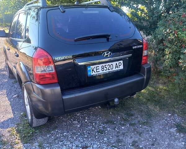 Чорний Хендай Туксон, об'ємом двигуна 2 л та пробігом 162 тис. км за 8800 $, фото 3 на Automoto.ua