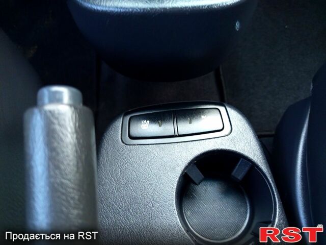 Черный Хендай Туксон, объемом двигателя 2 л и пробегом 187 тыс. км за 7900 $, фото 8 на Automoto.ua