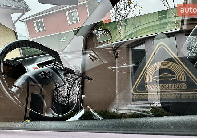 Чорний Хендай Туксон, об'ємом двигуна 2 л та пробігом 182 тис. км за 8299 $, фото 88 на Automoto.ua