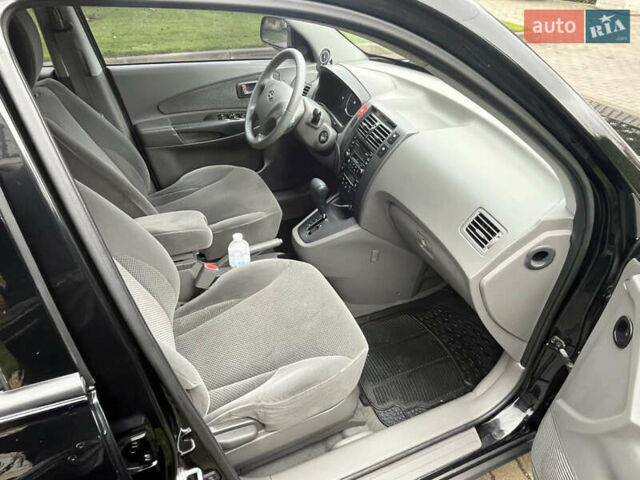 Черный Хендай Туксон, объемом двигателя 2 л и пробегом 107 тыс. км за 8900 $, фото 31 на Automoto.ua