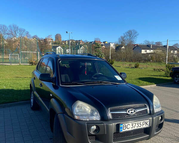 Чорний Хендай Туксон, об'ємом двигуна 1.99 л та пробігом 250 тис. км за 7800 $, фото 1 на Automoto.ua