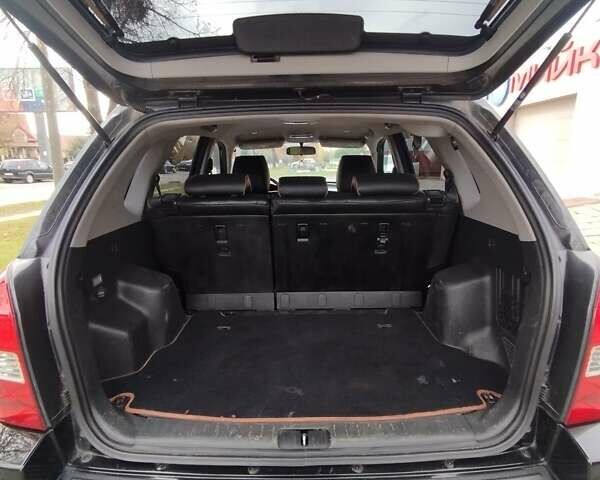 Черный Хендай Туксон, объемом двигателя 1.98 л и пробегом 214 тыс. км за 7700 $, фото 18 на Automoto.ua