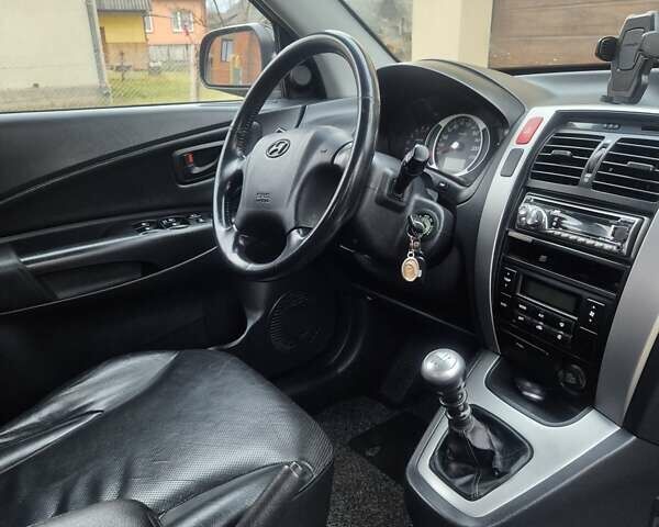 Чорний Хендай Туксон, об'ємом двигуна 1.99 л та пробігом 181 тис. км за 8150 $, фото 16 на Automoto.ua
