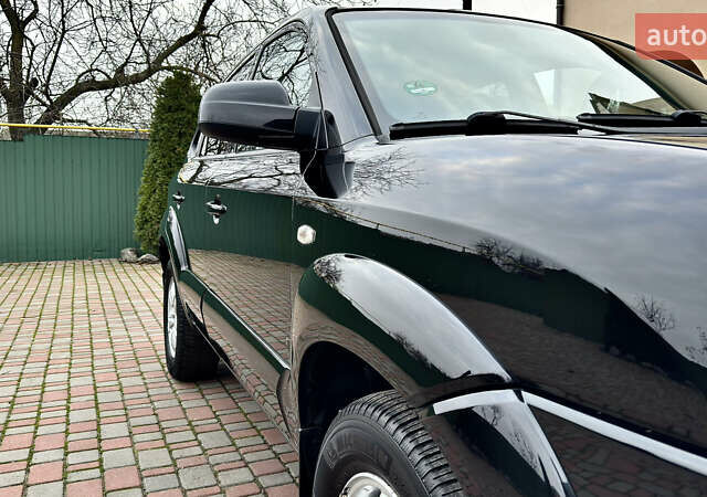 Чорний Хендай Туксон, об'ємом двигуна 2 л та пробігом 182 тис. км за 8299 $, фото 11 на Automoto.ua