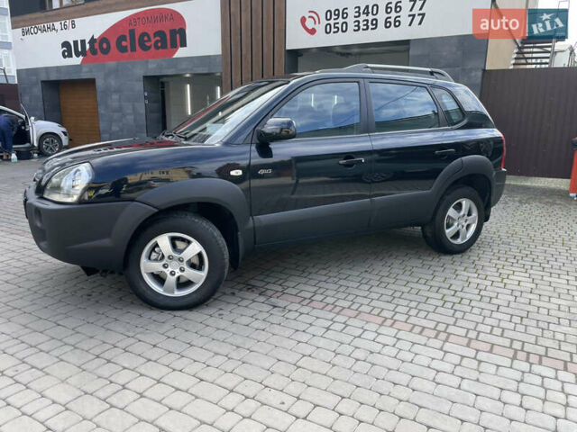 Черный Хендай Туксон, объемом двигателя 1.98 л и пробегом 177 тыс. км за 7600 $, фото 14 на Automoto.ua