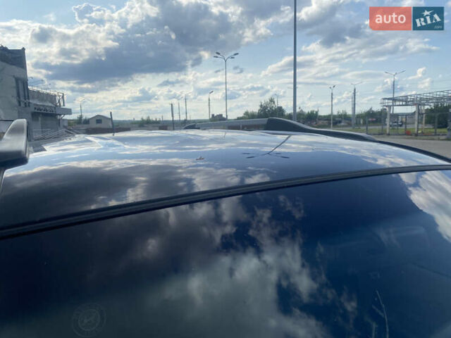 Черный Хендай Туксон, объемом двигателя 2 л и пробегом 270 тыс. км за 7300 $, фото 8 на Automoto.ua