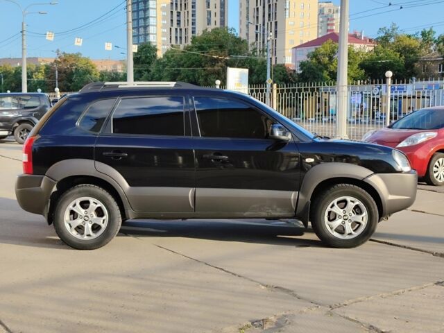 Черный Хендай Туксон, объемом двигателя 2 л и пробегом 82 тыс. км за 7490 $, фото 8 на Automoto.ua