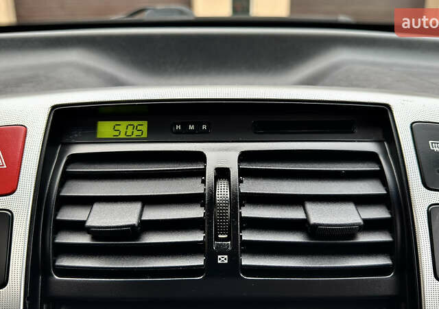 Чорний Хендай Туксон, об'ємом двигуна 2 л та пробігом 182 тис. км за 8299 $, фото 63 на Automoto.ua