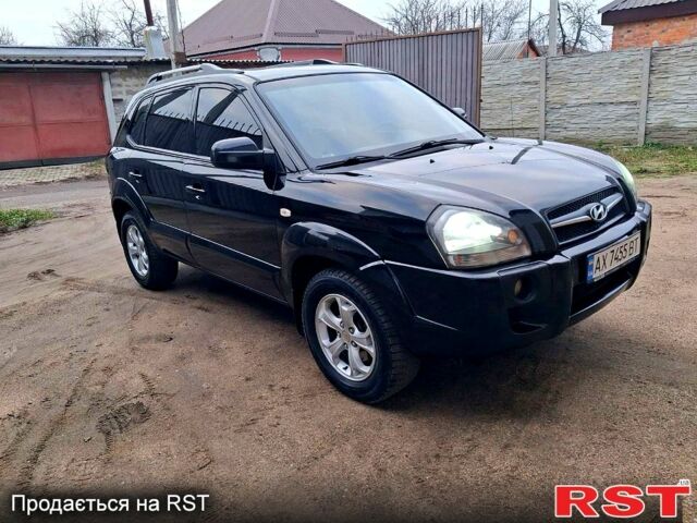 Чорний Хендай Туксон, об'ємом двигуна 2 л та пробігом 208 тис. км за 7500 $, фото 9 на Automoto.ua