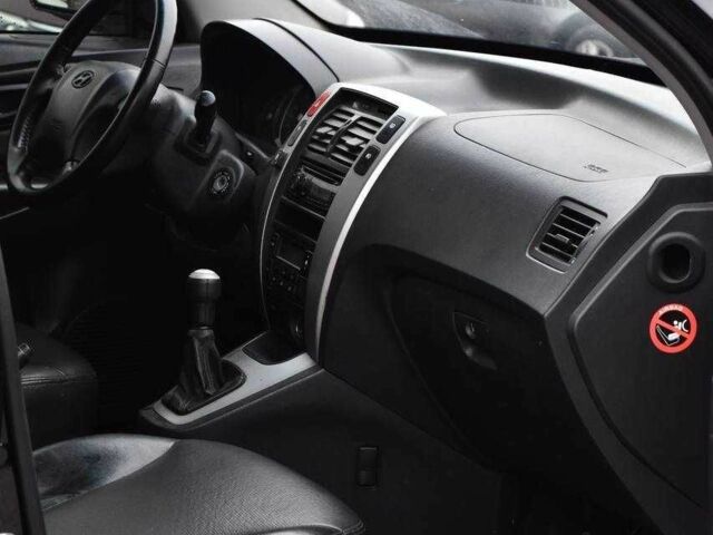 Чорний Хендай Туксон, об'ємом двигуна 2 л та пробігом 204 тис. км за 8650 $, фото 11 на Automoto.ua