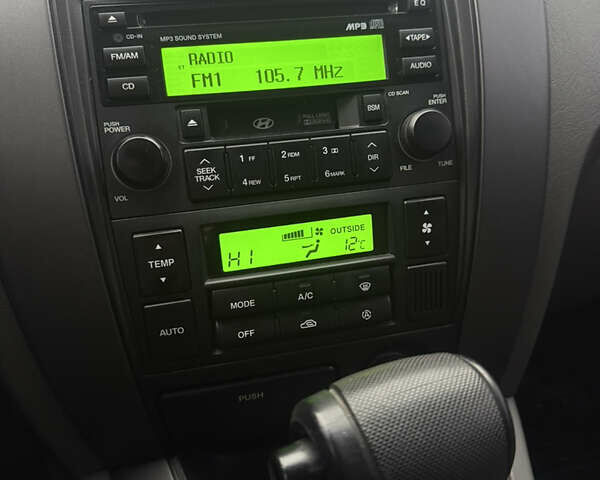 Чорний Хендай Туксон, об'ємом двигуна 2 л та пробігом 107 тис. км за 8500 $, фото 22 на Automoto.ua