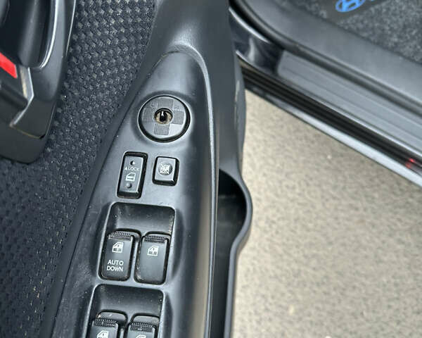 Черный Хендай Туксон, объемом двигателя 2 л и пробегом 136 тыс. км за 8500 $, фото 13 на Automoto.ua