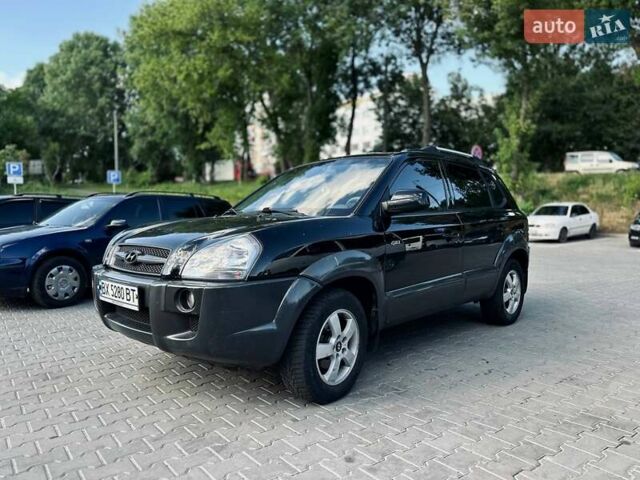 Черный Хендай Туксон, объемом двигателя 1.98 л и пробегом 206 тыс. км за 8300 $, фото 17 на Automoto.ua