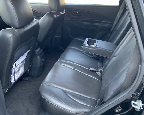 Черный Хендай Туксон, объемом двигателя 2 л и пробегом 220 тыс. км за 8700 $, фото 20 на Automoto.ua