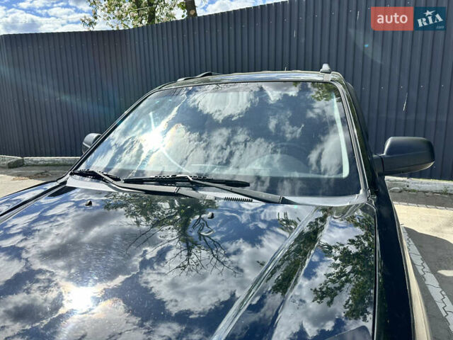 Чорний Хендай Туксон, об'ємом двигуна 1.98 л та пробігом 279 тис. км за 8200 $, фото 10 на Automoto.ua