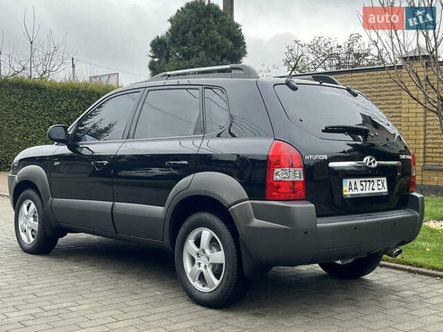 Черный Хендай Туксон, объемом двигателя 2 л и пробегом 107 тыс. км за 8900 $, фото 6 на Automoto.ua