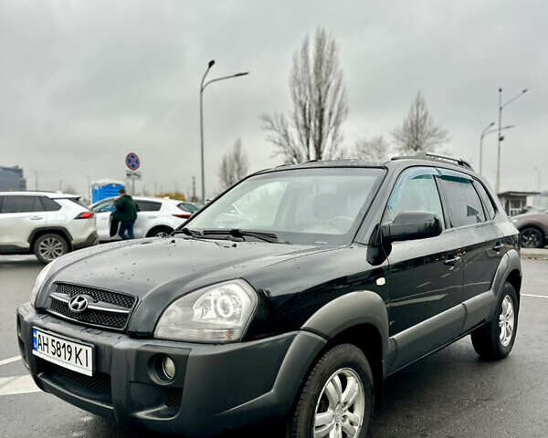 Чорний Хендай Туксон, об'ємом двигуна 1.98 л та пробігом 238 тис. км за 8499 $, фото 9 на Automoto.ua