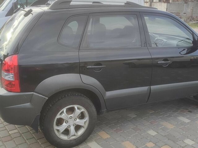 Чорний Хендай Туксон, об'ємом двигуна 2 л та пробігом 214 тис. км за 6000 $, фото 9 на Automoto.ua