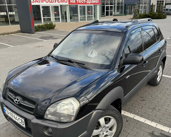 Чорний Хендай Туксон, об'ємом двигуна 1.98 л та пробігом 318 тис. км за 7399 $, фото 14 на Automoto.ua