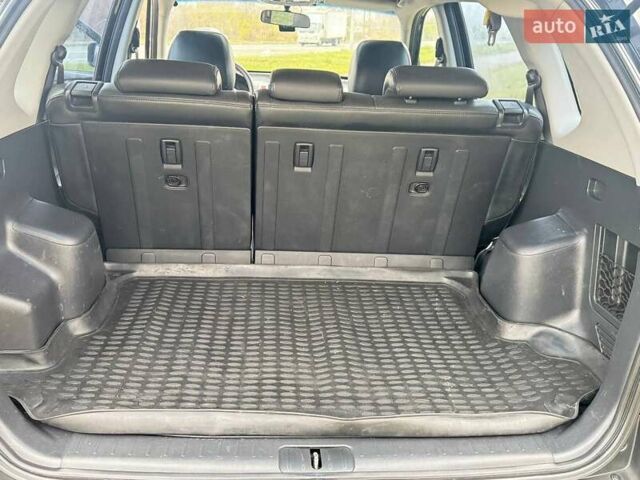 Черный Хендай Туксон, объемом двигателя 2 л и пробегом 148 тыс. км за 9500 $, фото 17 на Automoto.ua