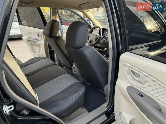 Черный Хендай Туксон, объемом двигателя 1.98 л и пробегом 196 тыс. км за 7999 $, фото 17 на Automoto.ua