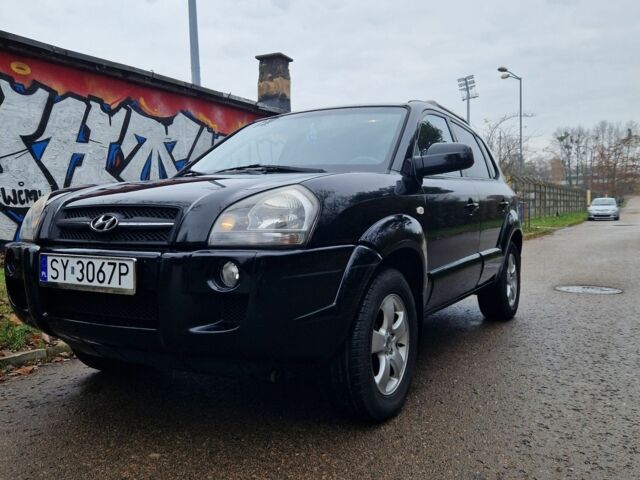 Черный Хендай Туксон, объемом двигателя 2 л и пробегом 190 тыс. км за 1843 $, фото 1 на Automoto.ua