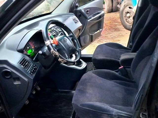 Черный Хендай Туксон, объемом двигателя 2 л и пробегом 0 тыс. км за 7800 $, фото 7 на Automoto.ua