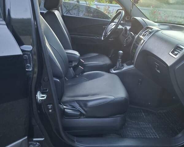 Черный Хендай Туксон, объемом двигателя 2 л и пробегом 197 тыс. км за 8000 $, фото 7 на Automoto.ua