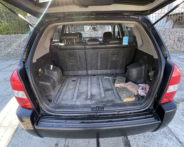 Черный Хендай Туксон, объемом двигателя 1.98 л и пробегом 262 тыс. км за 7900 $, фото 13 на Automoto.ua