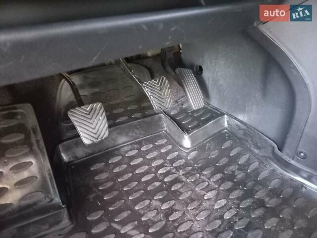 Черный Хендай Туксон, объемом двигателя 1.98 л и пробегом 43 тыс. км за 9850 $, фото 98 на Automoto.ua