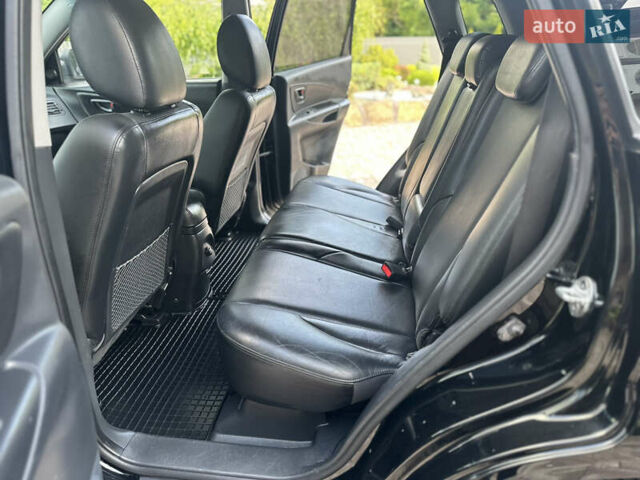 Черный Хендай Туксон, объемом двигателя 2 л и пробегом 218 тыс. км за 8700 $, фото 33 на Automoto.ua