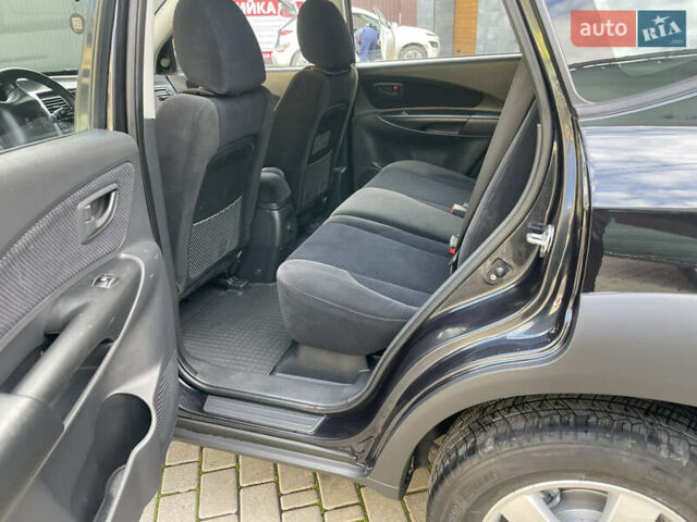 Черный Хендай Туксон, объемом двигателя 1.98 л и пробегом 177 тыс. км за 7600 $, фото 22 на Automoto.ua