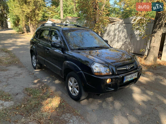 Черный Хендай Туксон, объемом двигателя 1.98 л и пробегом 260 тыс. км за 7777 $, фото 7 на Automoto.ua