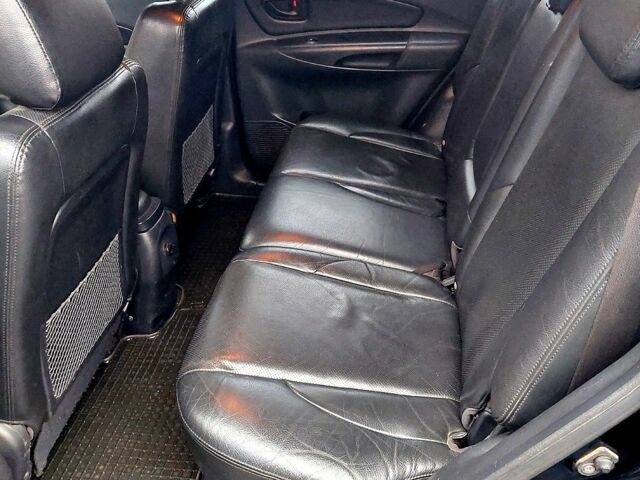 Черный Хендай Туксон, объемом двигателя 2 л и пробегом 268 тыс. км за 8700 $, фото 3 на Automoto.ua