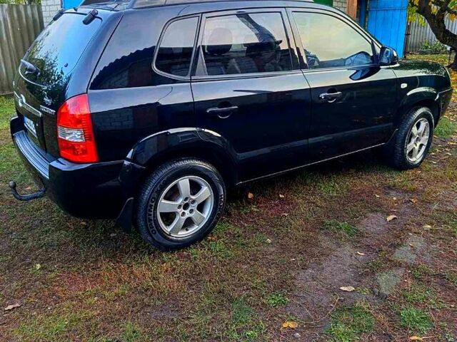 Черный Хендай Туксон, объемом двигателя 2 л и пробегом 187 тыс. км за 7900 $, фото 5 на Automoto.ua