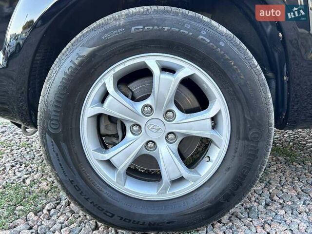 Черный Хендай Туксон, объемом двигателя 2 л и пробегом 230 тыс. км за 7500 $, фото 9 на Automoto.ua
