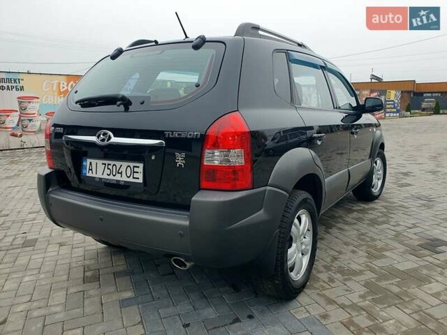 Чорний Хендай Туксон, об'ємом двигуна 2 л та пробігом 225 тис. км за 8000 $, фото 7 на Automoto.ua