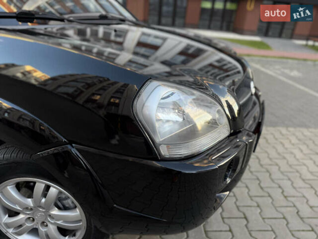 Чорний Хендай Туксон, об'ємом двигуна 2 л та пробігом 156 тис. км за 7850 $, фото 42 на Automoto.ua