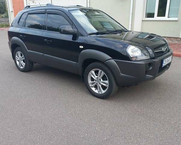 Черный Хендай Туксон, объемом двигателя 2 л и пробегом 168 тыс. км за 9000 $, фото 5 на Automoto.ua