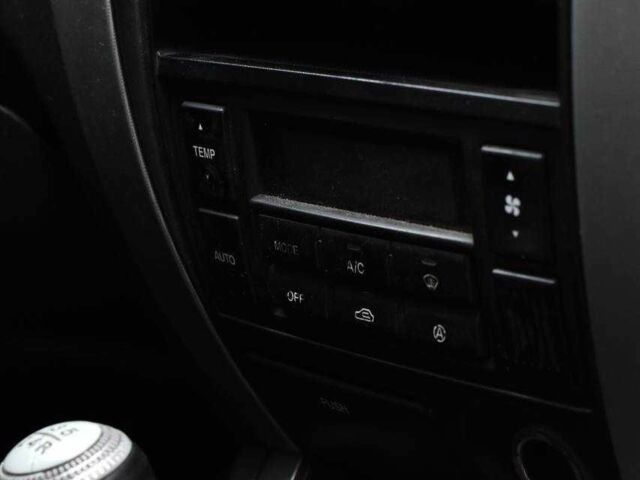 Чорний Хендай Туксон, об'ємом двигуна 2 л та пробігом 204 тис. км за 8650 $, фото 12 на Automoto.ua