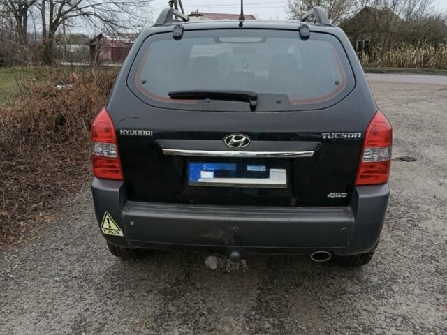 Черный Хендай Туксон, объемом двигателя 2 л и пробегом 276 тыс. км за 8500 $, фото 3 на Automoto.ua