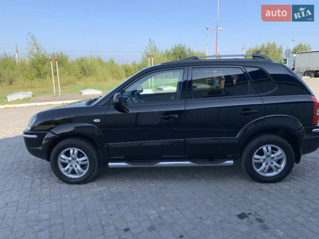 Черный Хендай Туксон, объемом двигателя 2 л и пробегом 220 тыс. км за 8700 $, фото 12 на Automoto.ua