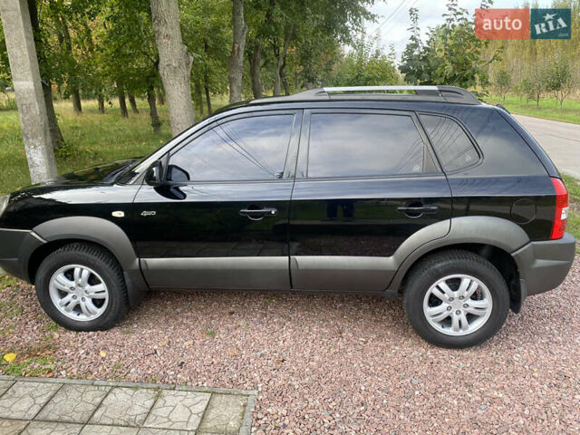 Чорний Хендай Туксон, об'ємом двигуна 2 л та пробігом 160 тис. км за 8800 $, фото 7 на Automoto.ua