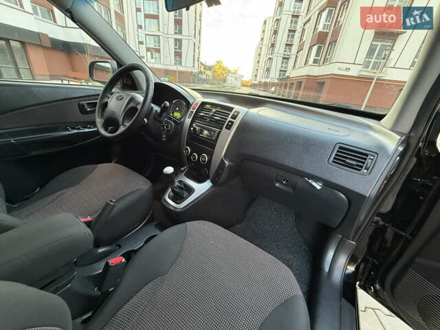Чорний Хендай Туксон, об'ємом двигуна 2 л та пробігом 156 тис. км за 7850 $, фото 37 на Automoto.ua