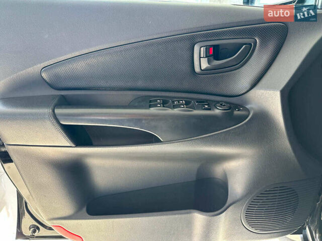 Черный Хендай Туксон, объемом двигателя 2.7 л и пробегом 158 тыс. км за 7940 $, фото 19 на Automoto.ua