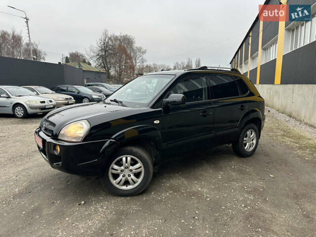 Чорний Хендай Туксон, об'ємом двигуна 2 л та пробігом 243 тис. км за 7999 $, фото 5 на Automoto.ua