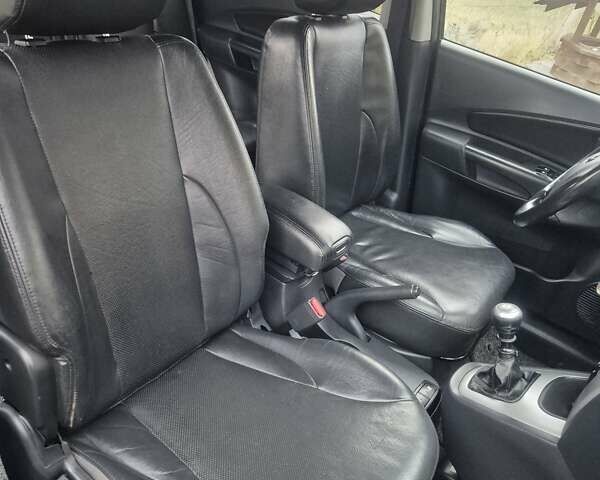 Чорний Хендай Туксон, об'ємом двигуна 1.99 л та пробігом 181 тис. км за 8150 $, фото 11 на Automoto.ua